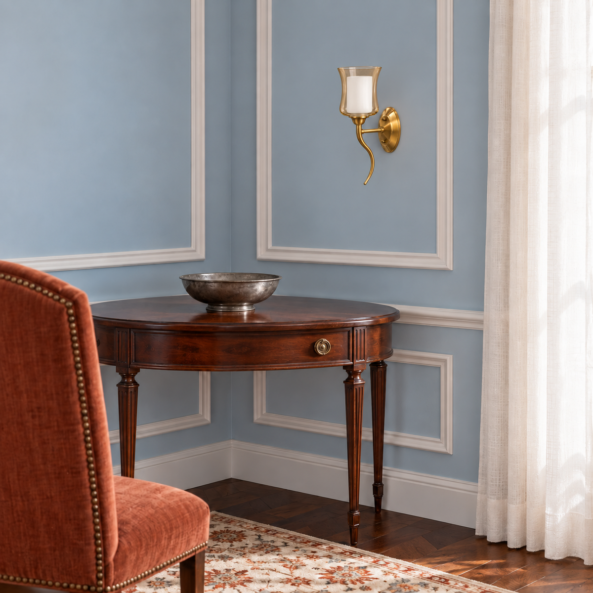 Amber and white glass scroll-stem wall light above a wooden console table in daylight, switched off