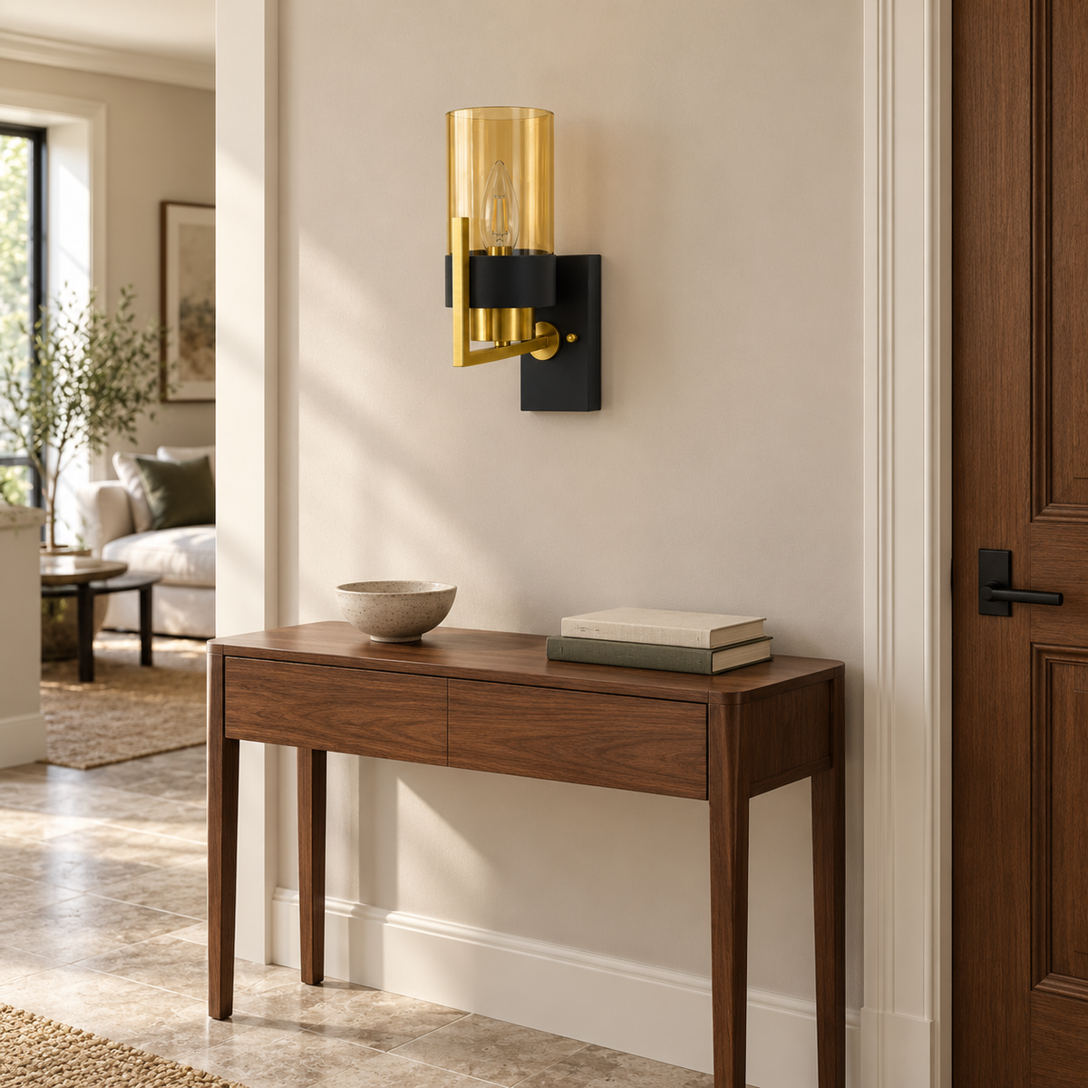 Amber Cylinder Black Band Wall Light above a wood console beside a door in daylight, switched off