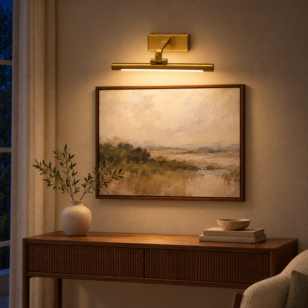 Gold-Toned Curved-Arm Picture Light, 350 mm illuminated in the same residential interior at night