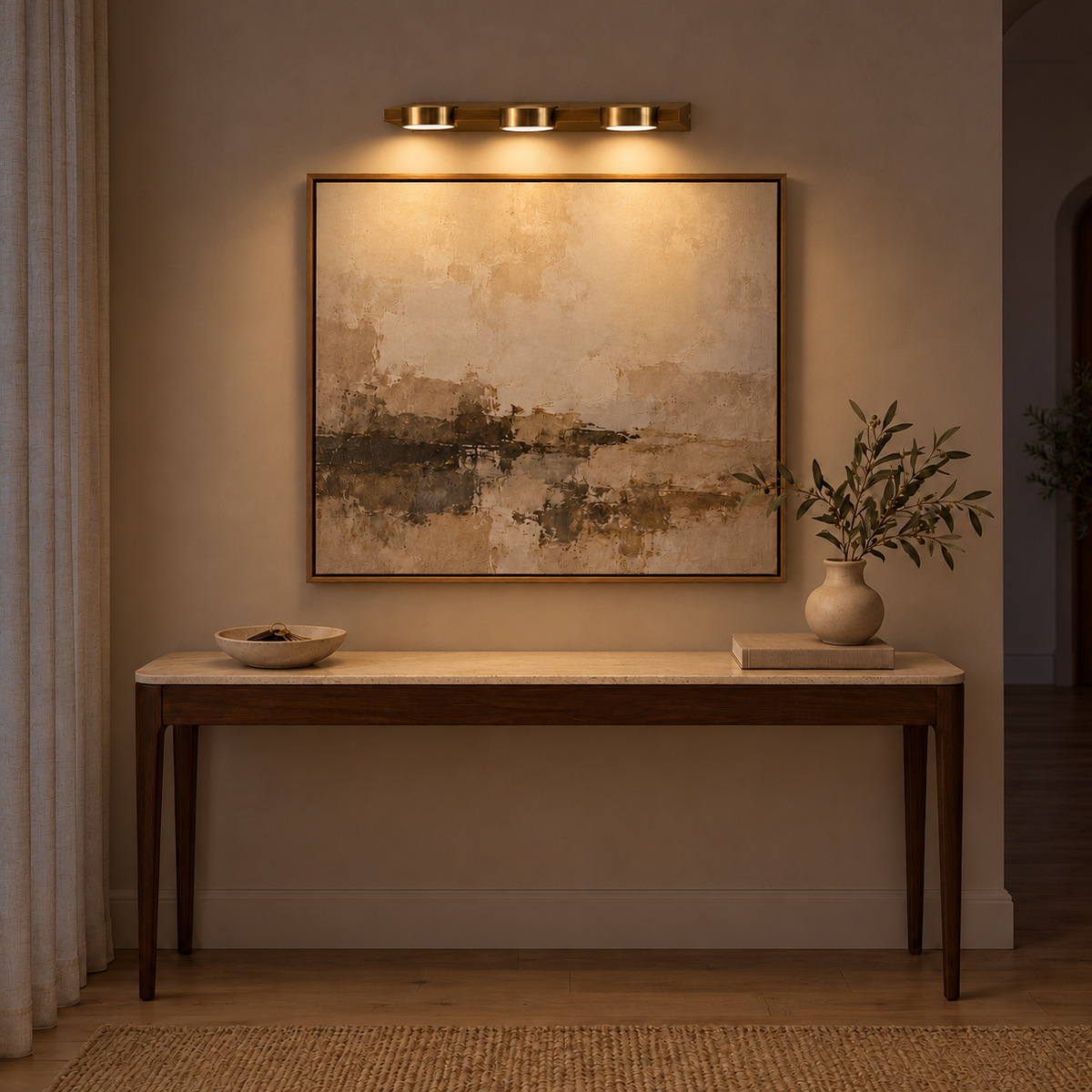 Gold-Toned 3-Puck Picture Light, 460 mm illuminated in the same residential interior at night