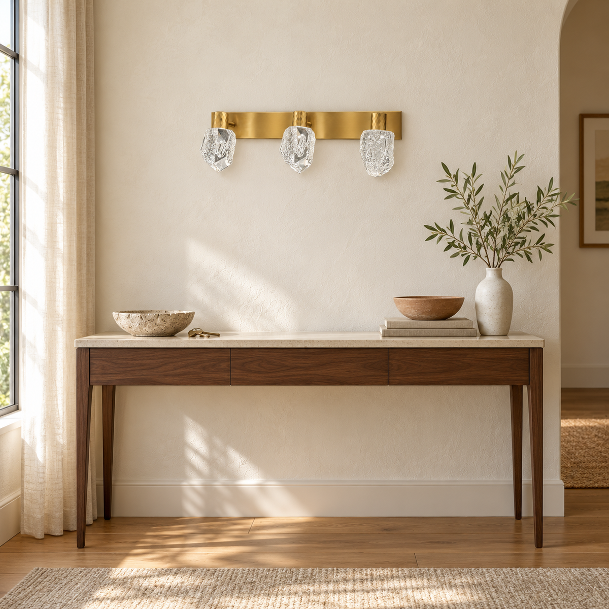 Gold Faceted Acrylic 3-Head Picture Light, 460 mm installed in a residential interior in daylight, light off