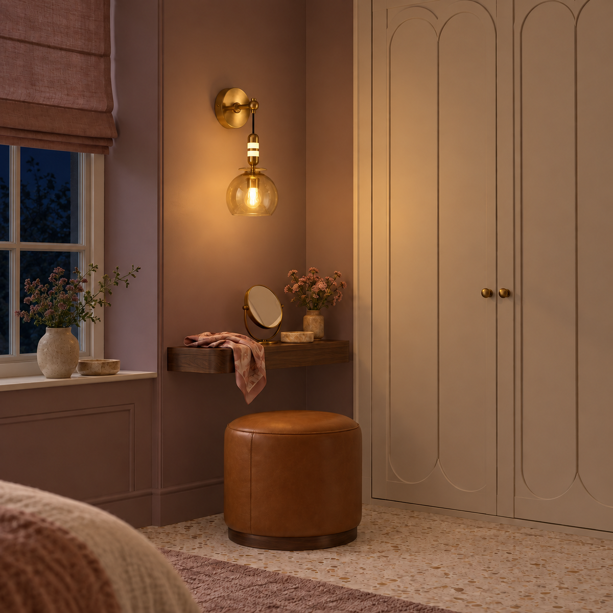 Amber glass pendant wall light illuminated above a dressing table at night