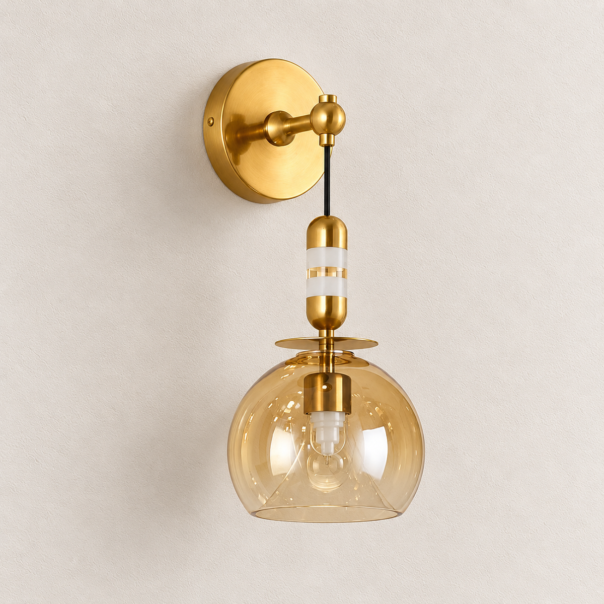 Amber glass pendant wall light with an acrylic capsule accent and round backplate, switched off