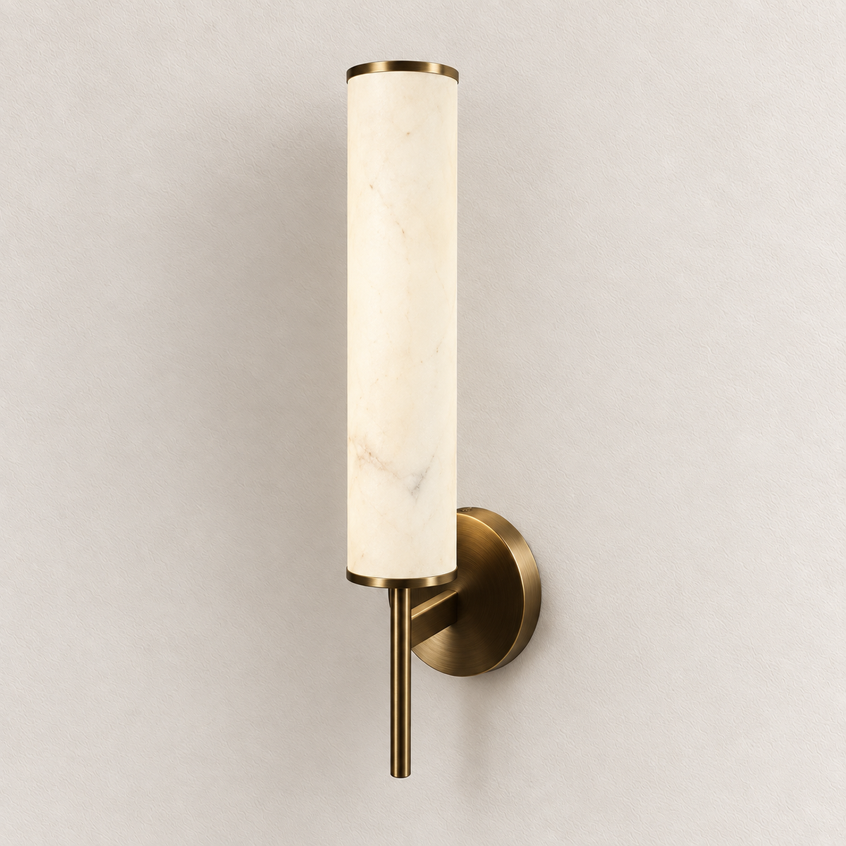 Stone-effect cylinder wall light with slim metallic trim, round backplate and lower stem, switched off