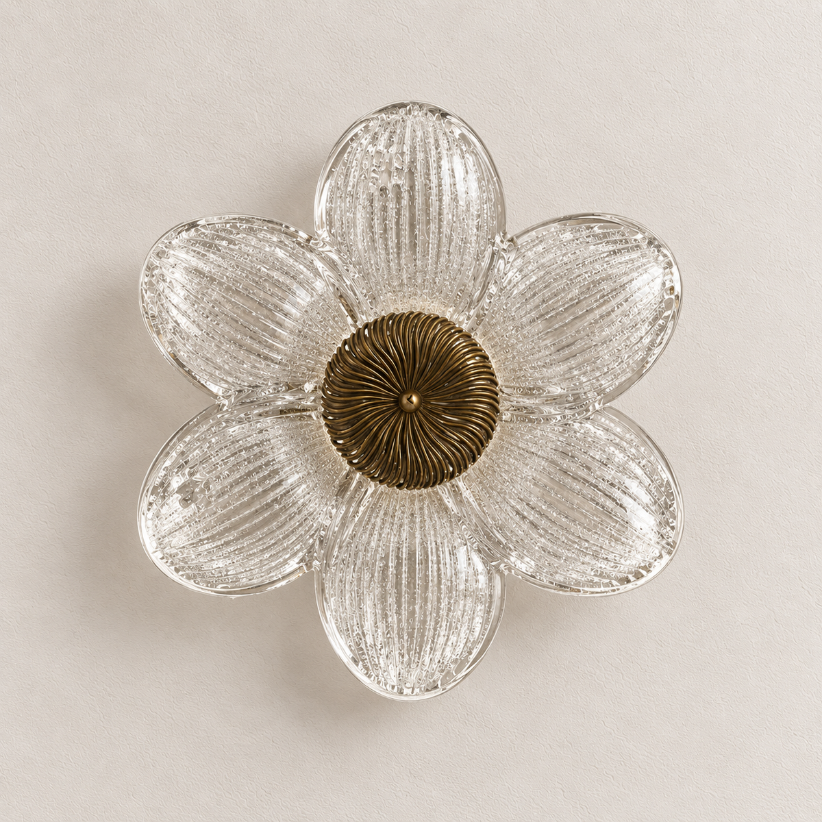 Six-petal clear glass flower wall light with textured petals and a ridged metallic centre, switched off