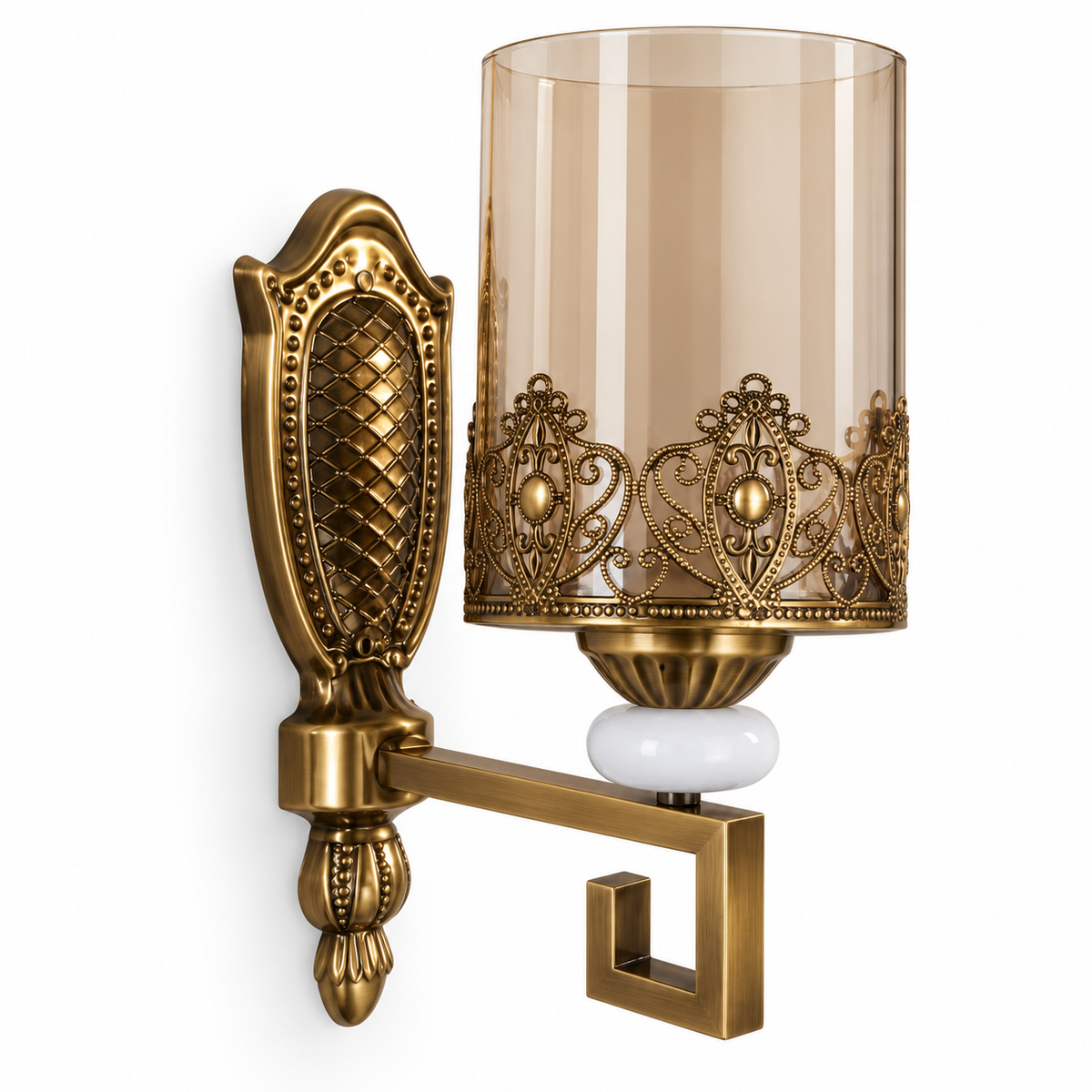 Amber cylindrical glass wall light with a filigree collar, quilted backplate and angular arm, switched off on a white background.