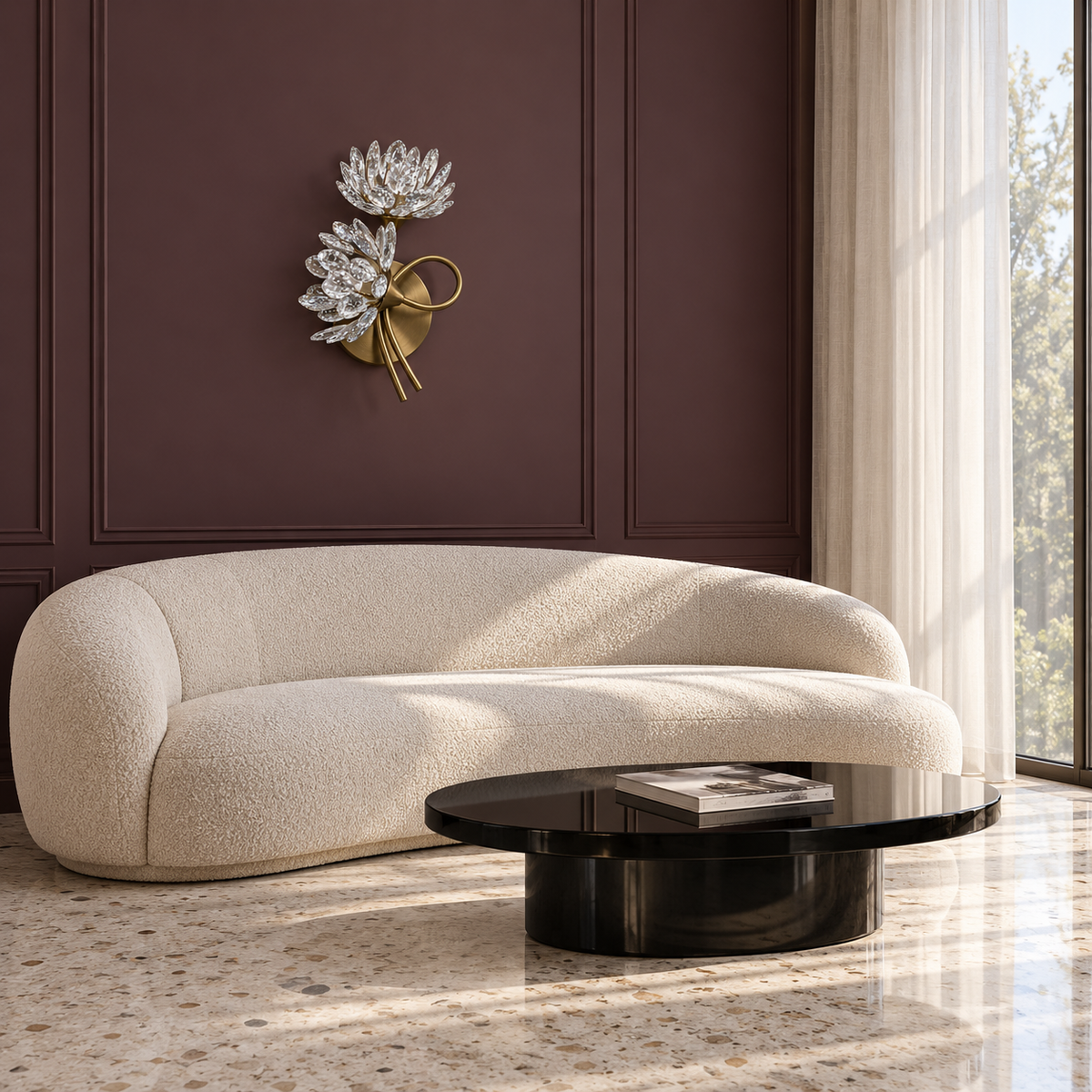 Twin Crystal Flower Loop-Stem Wall Light above a curved sofa in daylight, switched off