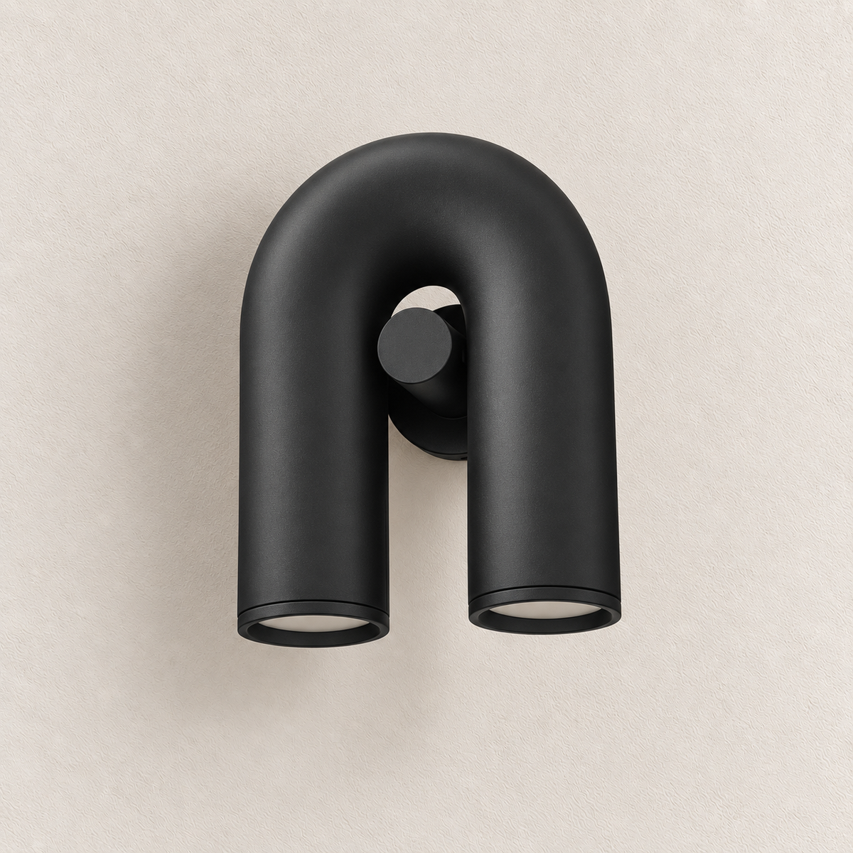 Black U-shaped wall light with two downward-facing openings and circular centre fitting, switched off