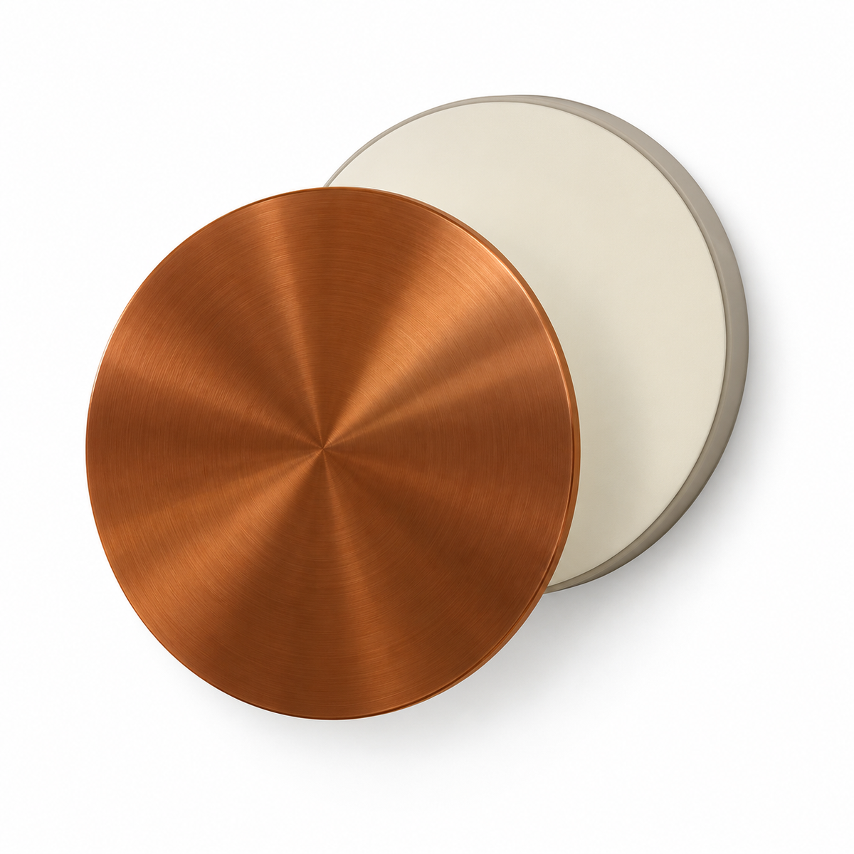 Copper-finished front disc overlapping a pale circular light surface, shown unlit on a white background.