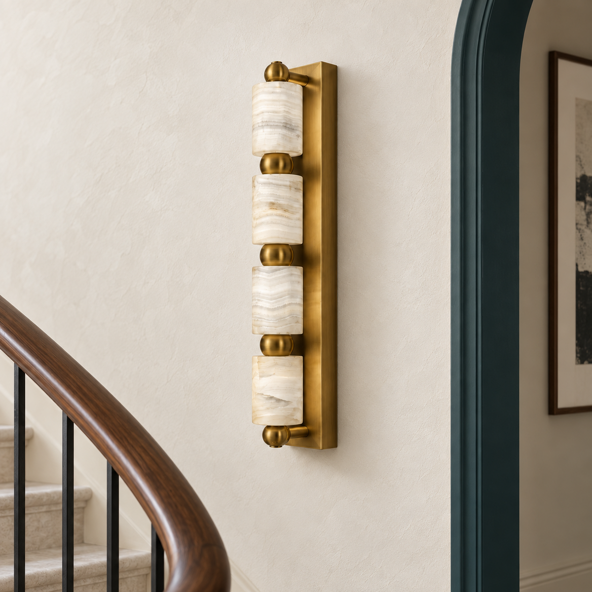 Four-cylinder marble wall light in a refined interior by day