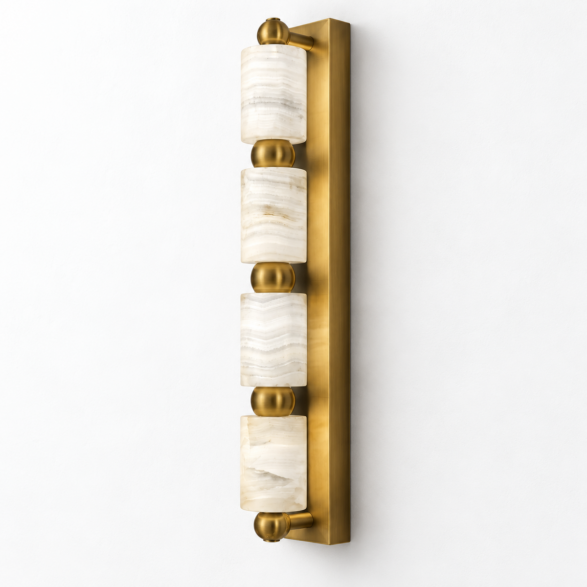Four-cylinder marble wall light with GAB finish on white background