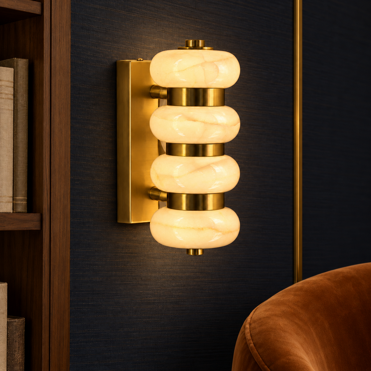 Stacked marble wall light illuminated in a refined interior at night