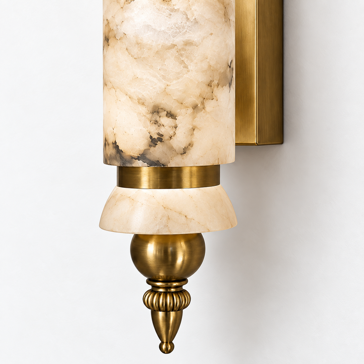 Close-up detail of ALYS12-1 marble and antique brass wall light