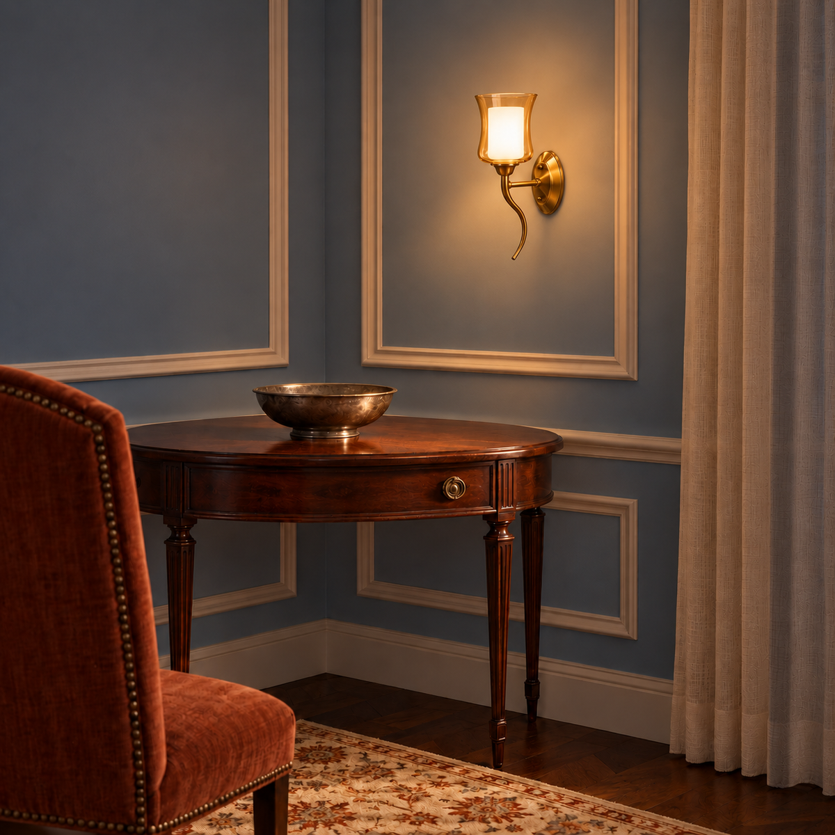 Amber and white glass scroll-stem wall light illuminated above a wooden console table at night