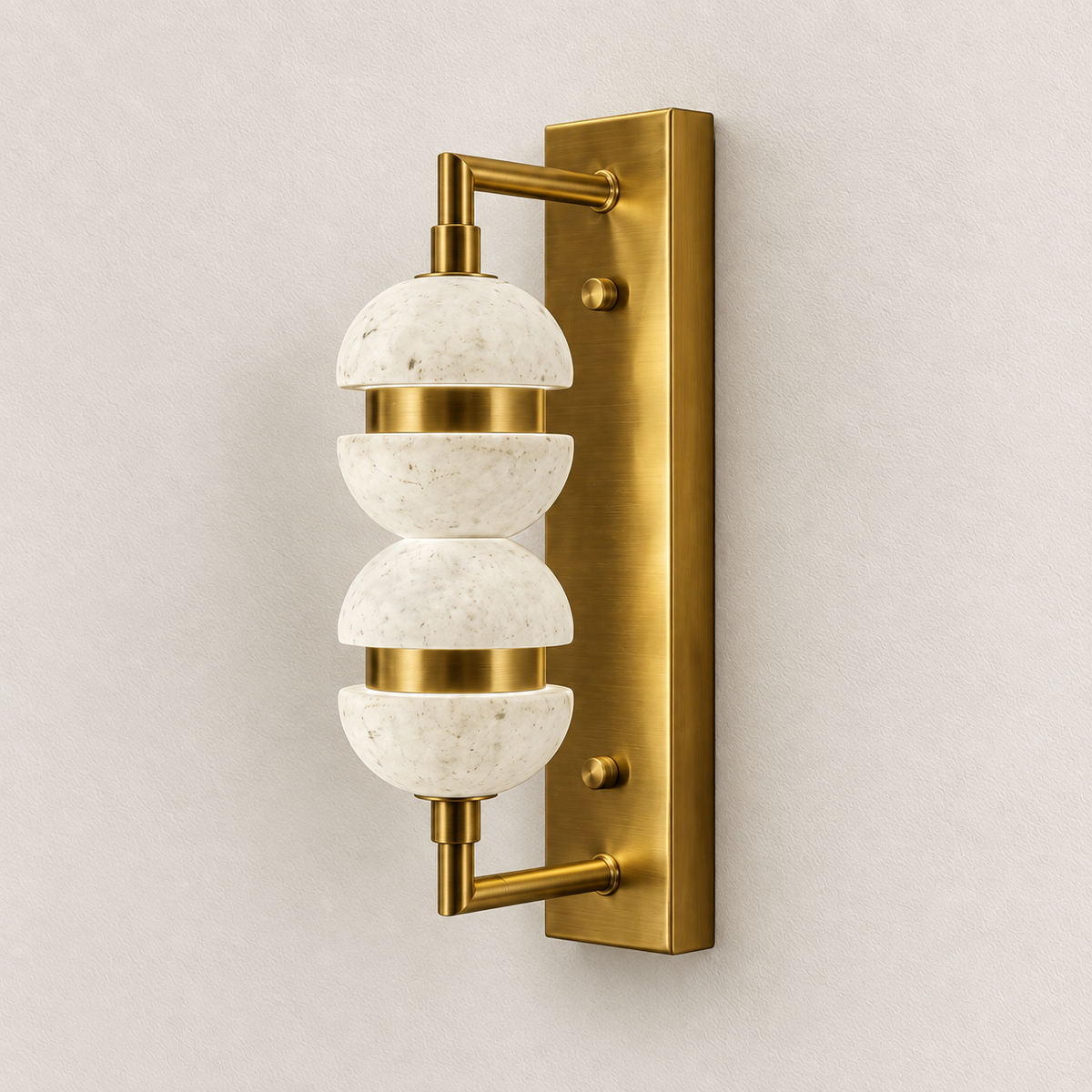 Stacked split-sphere marble wall light with metallic bands and rectangular backplate, switched off