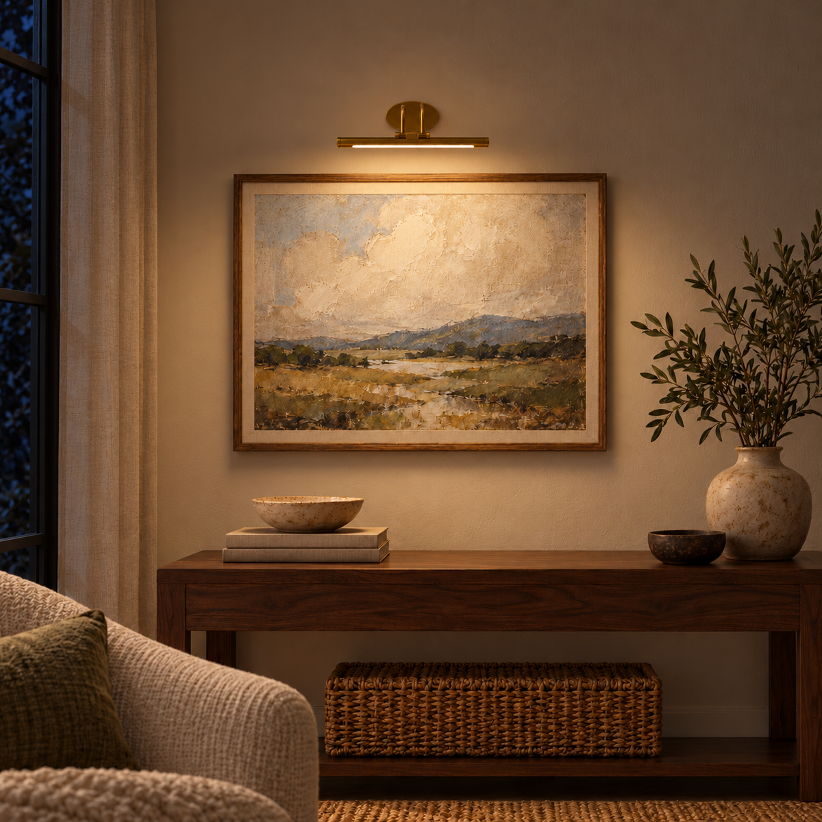 Gold-Toned Slim Cylinder Picture Light, 350 mm illuminated in the same residential interior at night