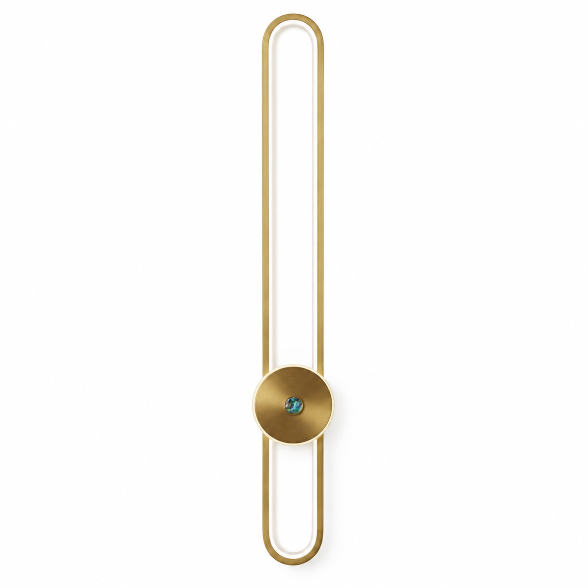 Antique gold-toned slender capsule loop wall light with a round lower disc, switched off against a white studio background.