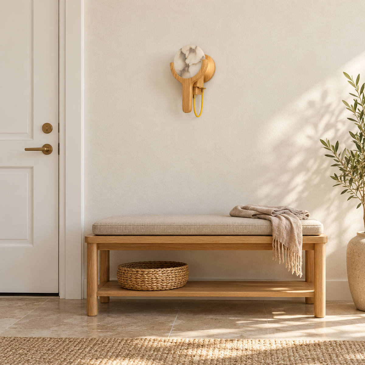 Stone Disc and Wood Cradle Wall Light installed in a daylight interior, switched off