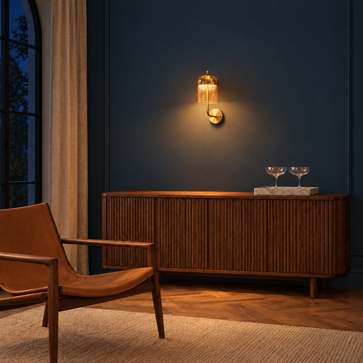 Amber Glass Bell-Shade Wall Light above a wooden sideboard illuminated at night