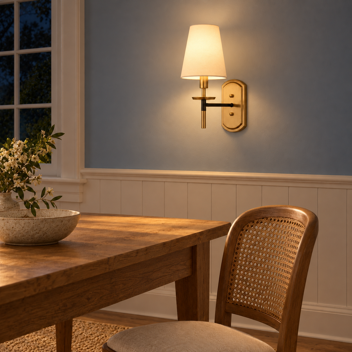 Tapered Cloth Black Arm Wall Light illuminated in a night-time interior