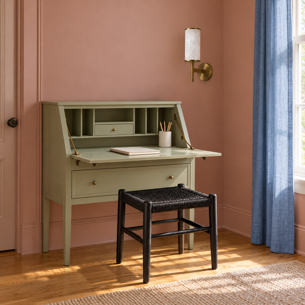 Stone-effect torch wall light above a compact writing desk in daylight, switched off