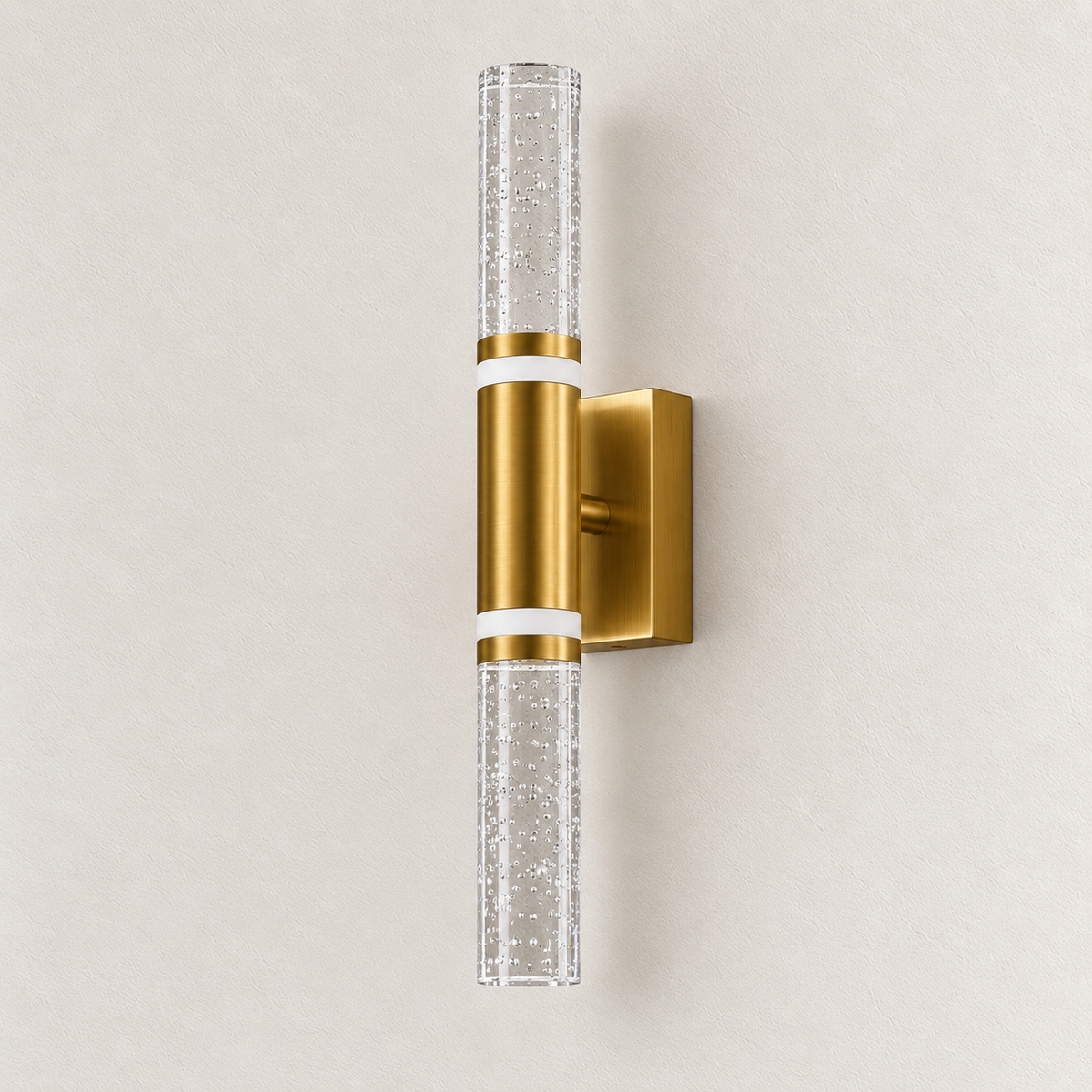 Bubble-textured acrylic baton wall light with a metallic centre and rectangular backplate, switched off