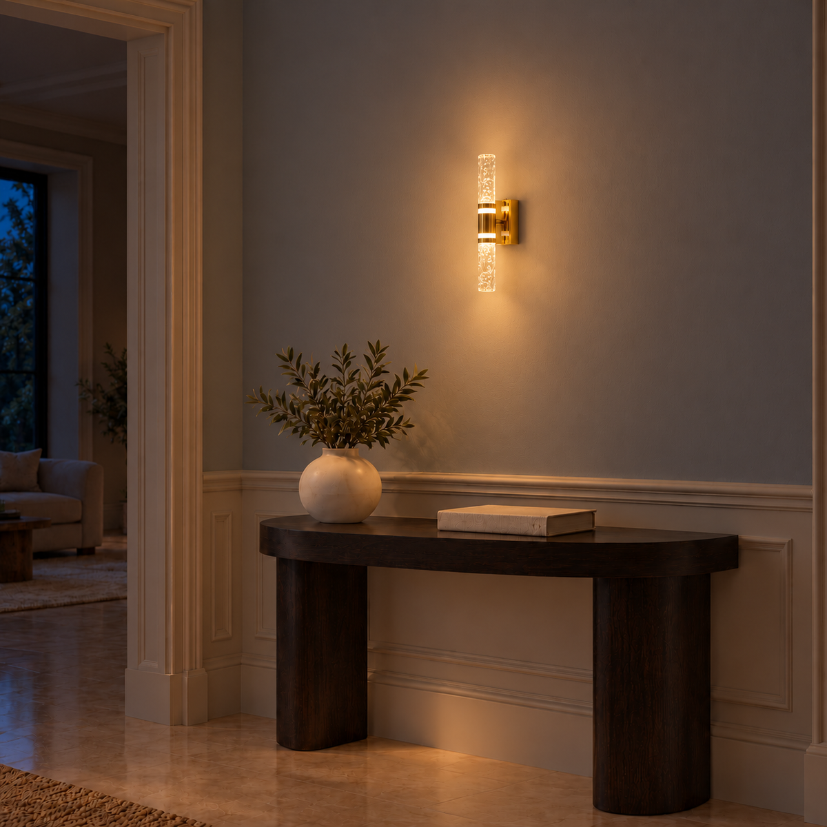 Faceted acrylic double-rod wall light illuminated above a console table at night