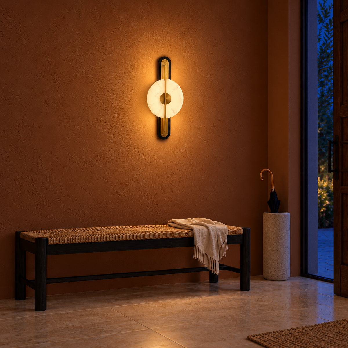 Veined Acrylic Disc and Linear Wall Light above a bench in an entrance area illuminated at night