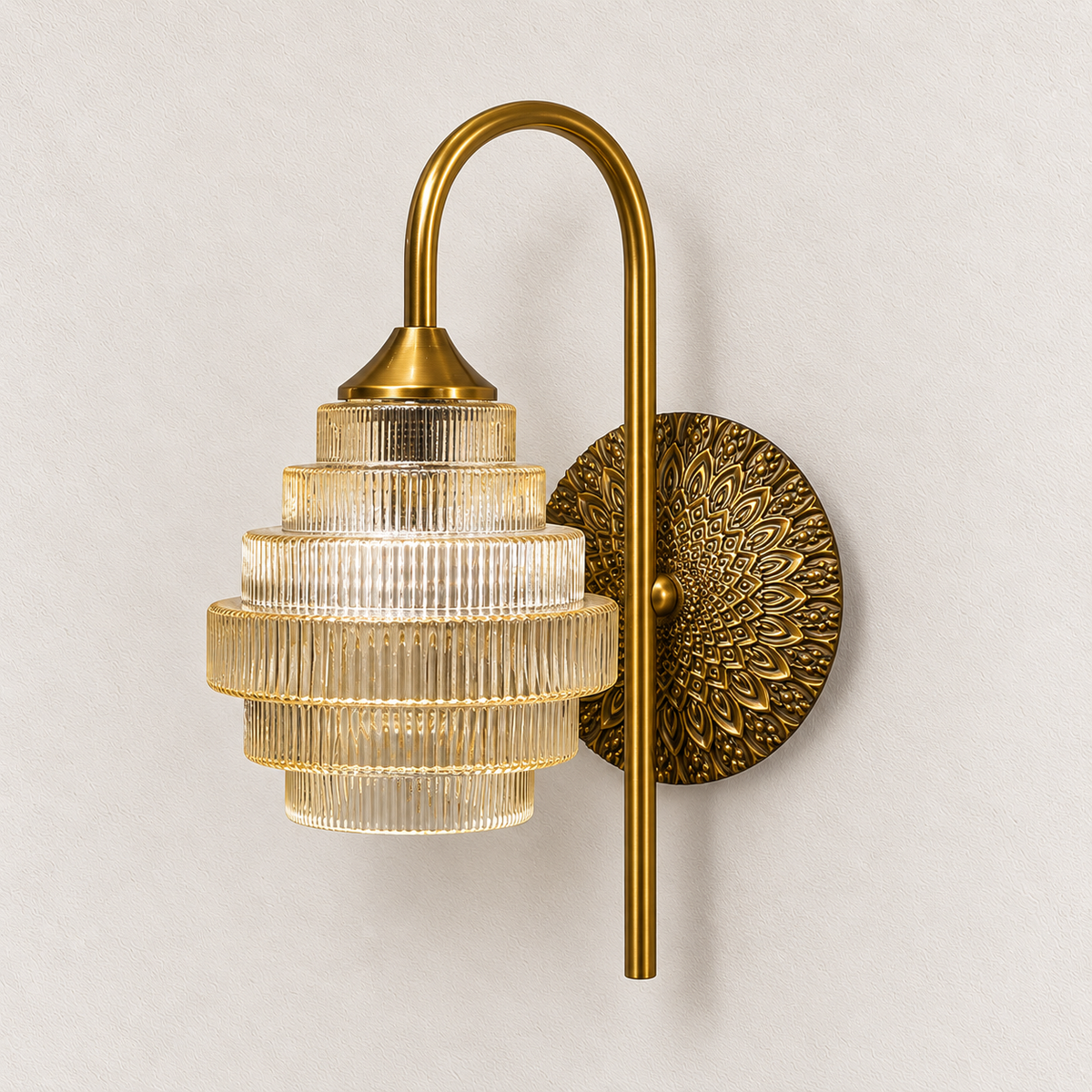 Tiered ribbed amber glass wall light with a tall curved arm and floral backplate, switched off