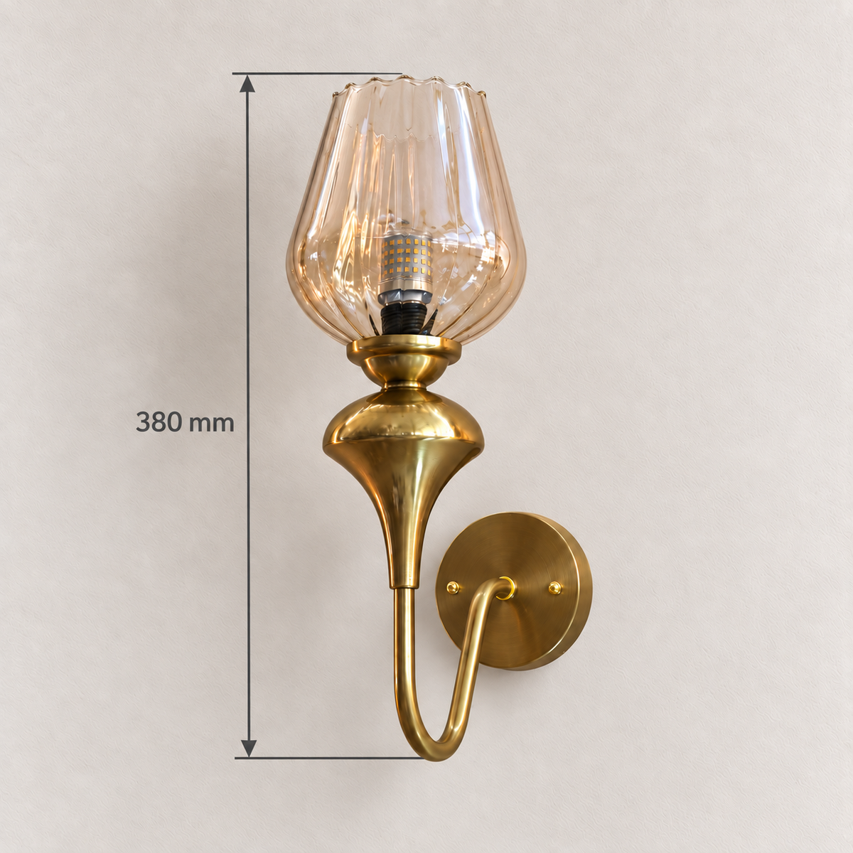 Ribbed amber glass loop-arm wall light showing 380 mm overall height