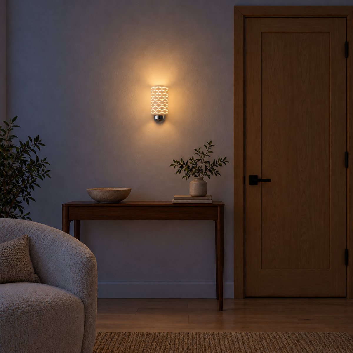 Honeycomb Pattern White Cylinder Wall Light illuminated in a night-time interior setting.