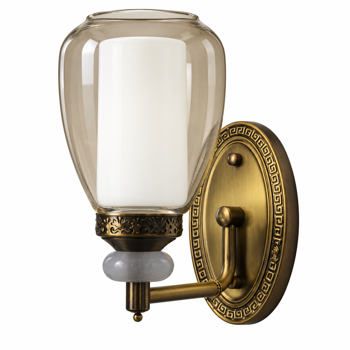 Tea-tinted outer glass wall light with a white inner diffuser and oval Greek-key backplate, switched off on a white background.