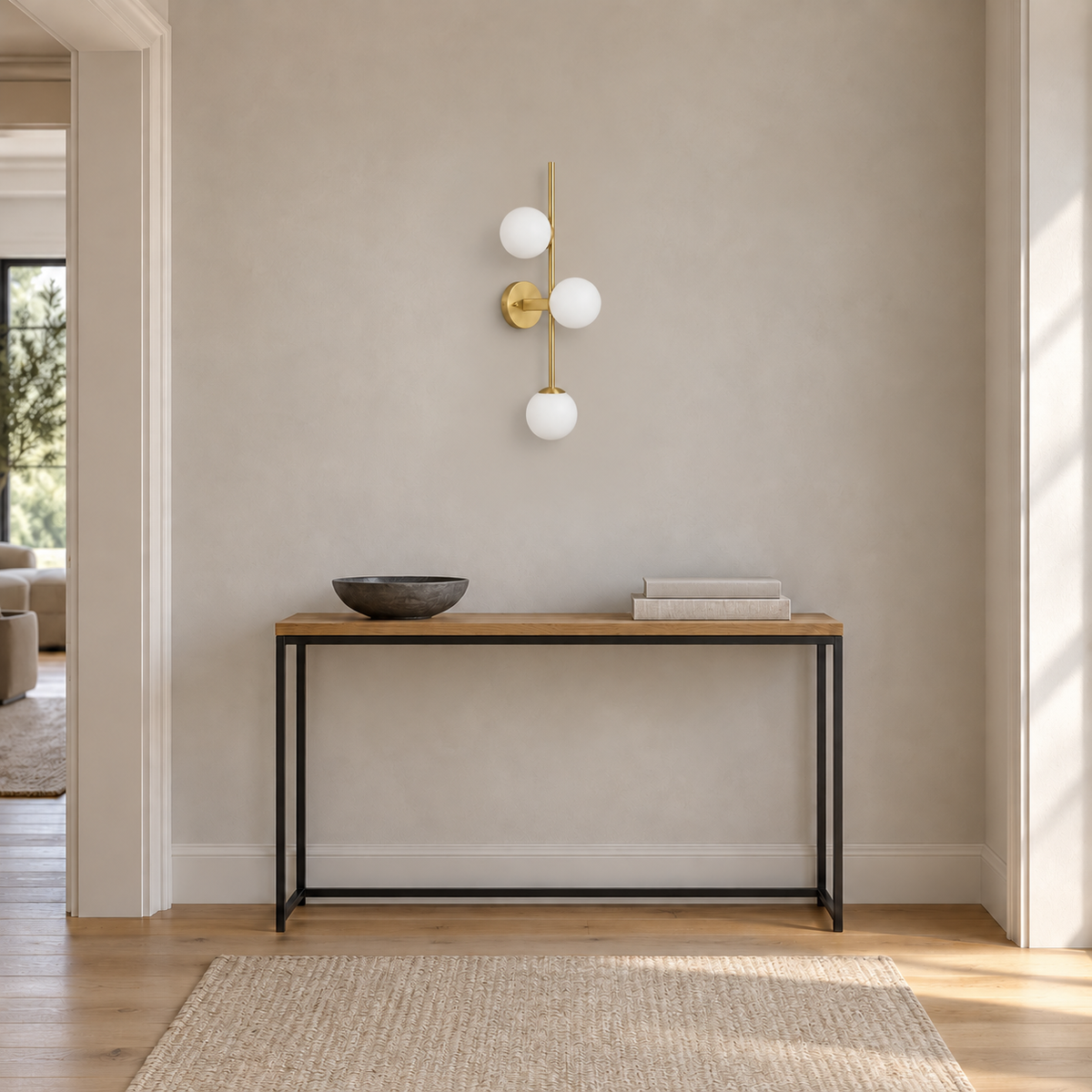 Three-Globe Stem Wall Light installed in a daylight interior, switched off