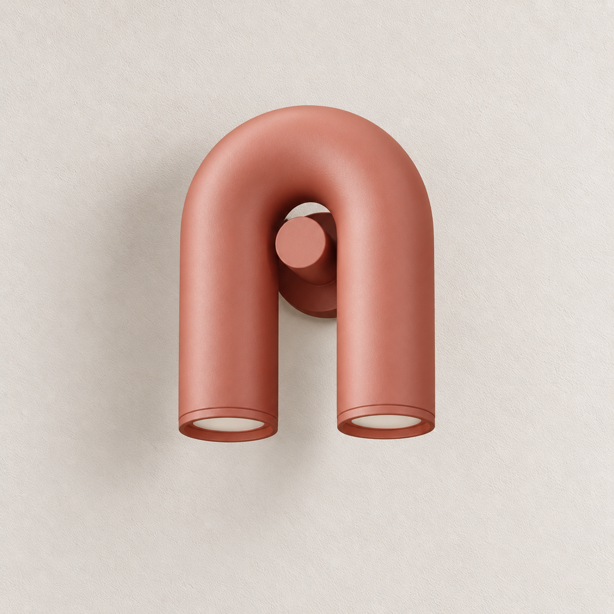 Red U-shaped wall light with two downward-facing openings and circular centre fitting, switched off