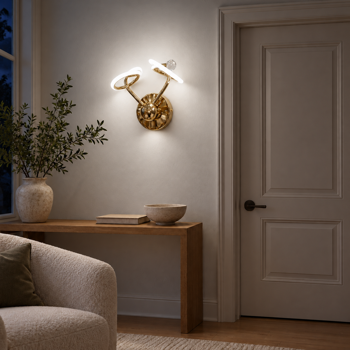 Twin Saucer Gold Wall Light illuminated in a night-time interior setting.