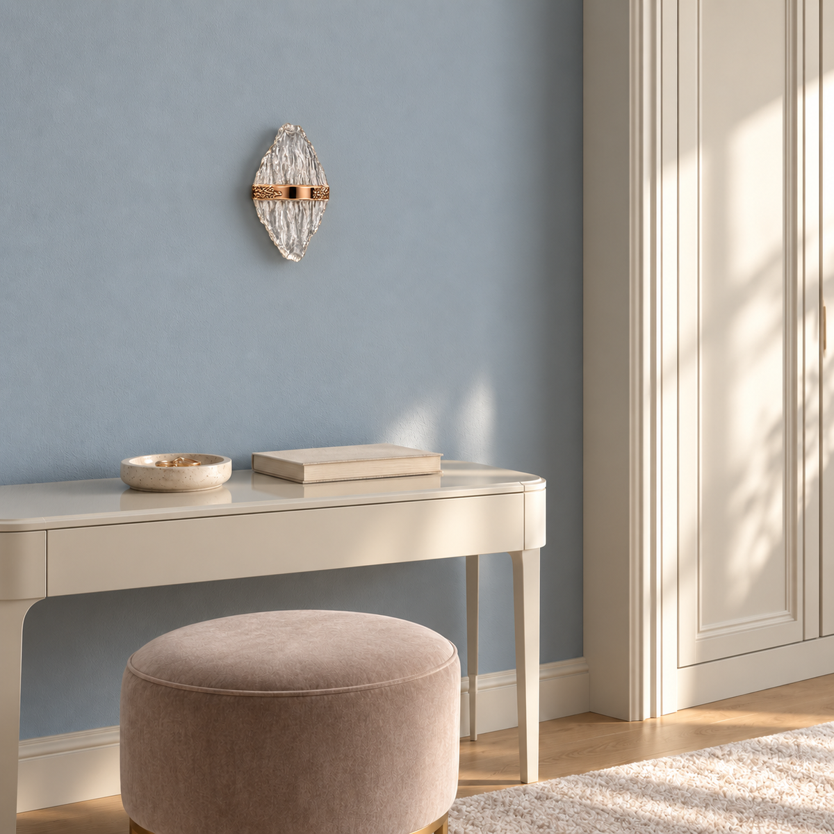 Rippling acrylic wall light above a console in a bright interior, switched off