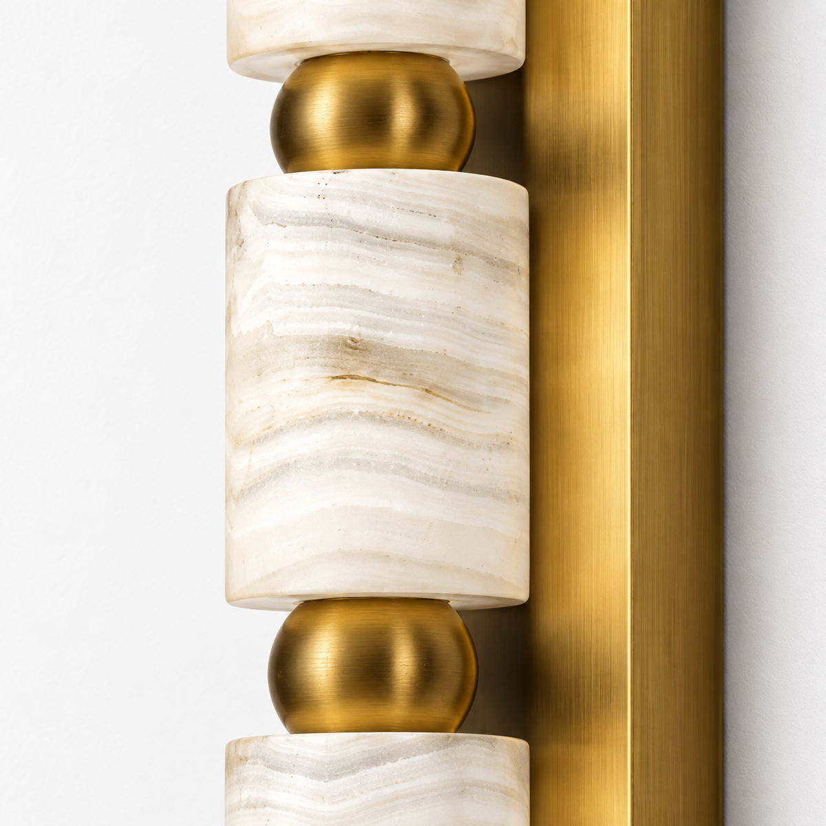 Close-up detail of the marble cylinders and GAB finish