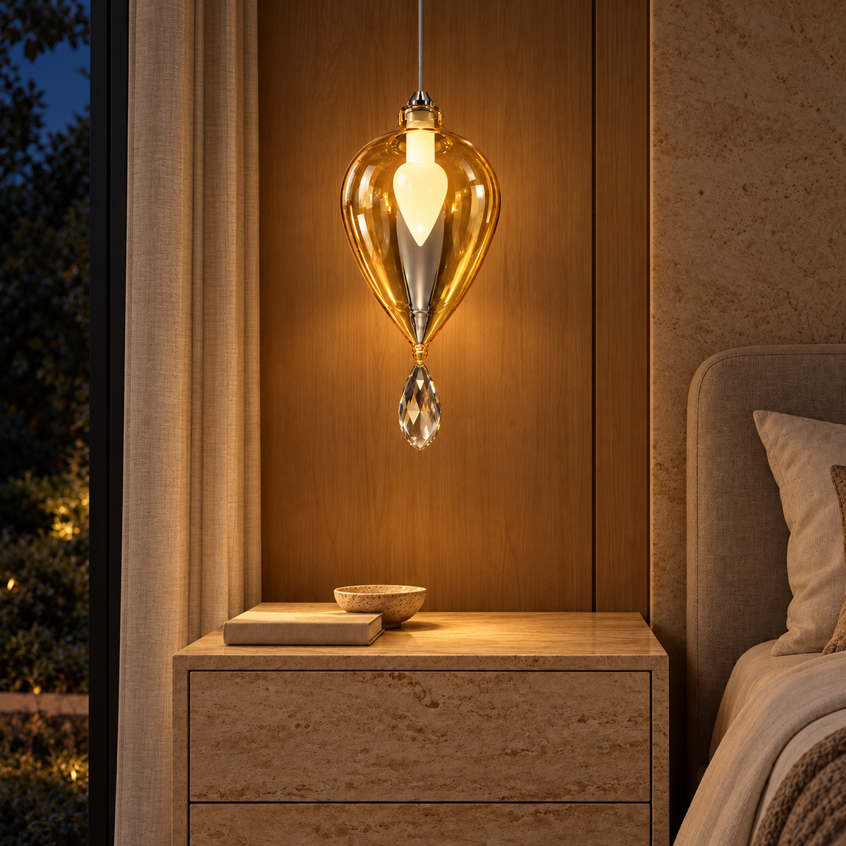 Amber Teardrop Single Pendant, illuminated in a nighttime interior