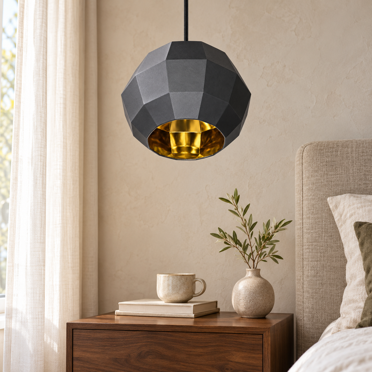Black & Gold Faceted Pendant, unlit in a daytime interior