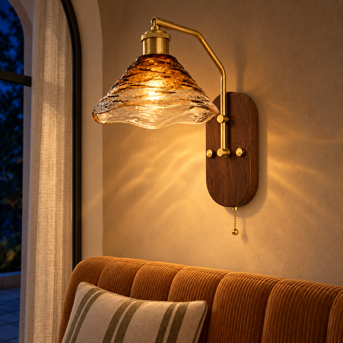 C3703 amber and clear textured glass wall light illuminated at night