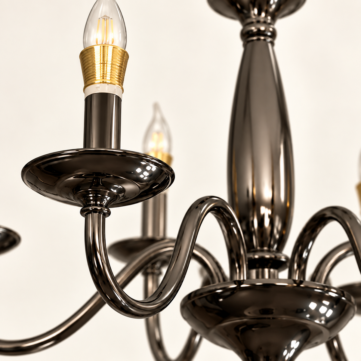 Close-up of SYLVENNE-S PBK chandelier arm and candle holder detail