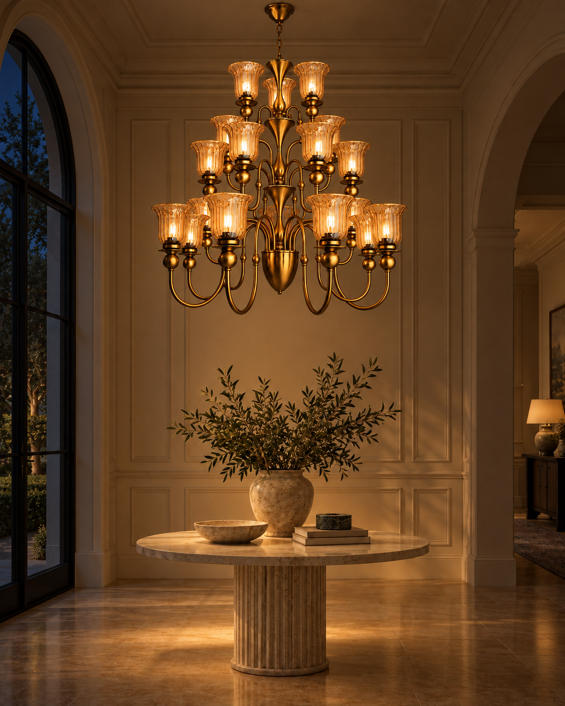 Three-tier amber glass AB chandelier in a warm interior at night